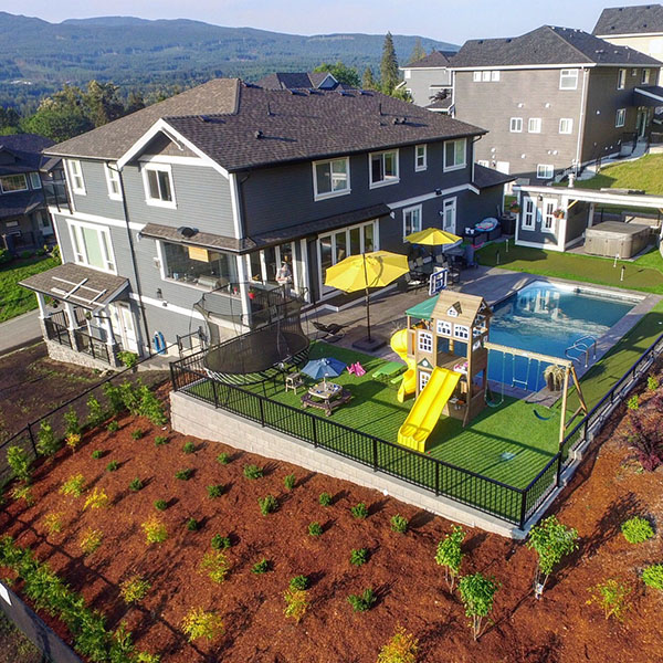 aerial view of house and backyard